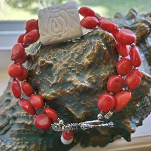 Bracelet., handcrafted, 7inches. Red Coral with Bone.